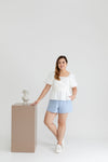 Textured Smocked-back Peplum Top (White)