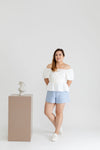 Textured Smocked-back Peplum Top (White)