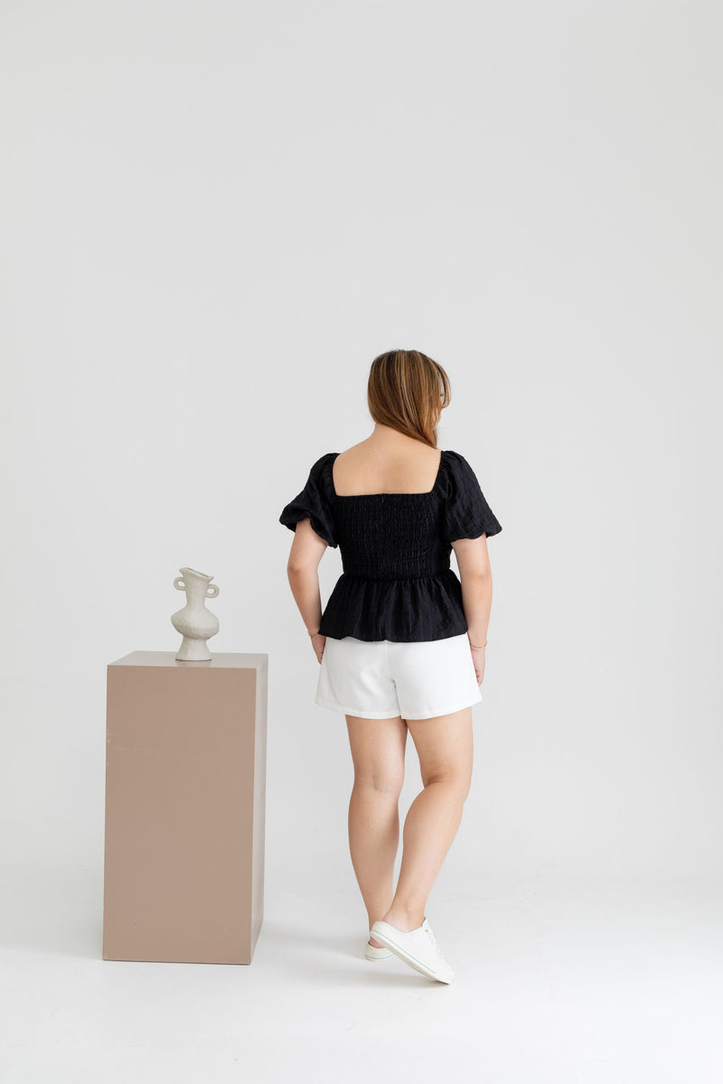 Textured Smocked-back Peplum Top (Black)