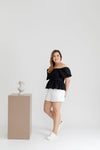 Textured Smocked-back Peplum Top (Black)