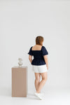 Textured Smocked-back Peplum Top (Navy)